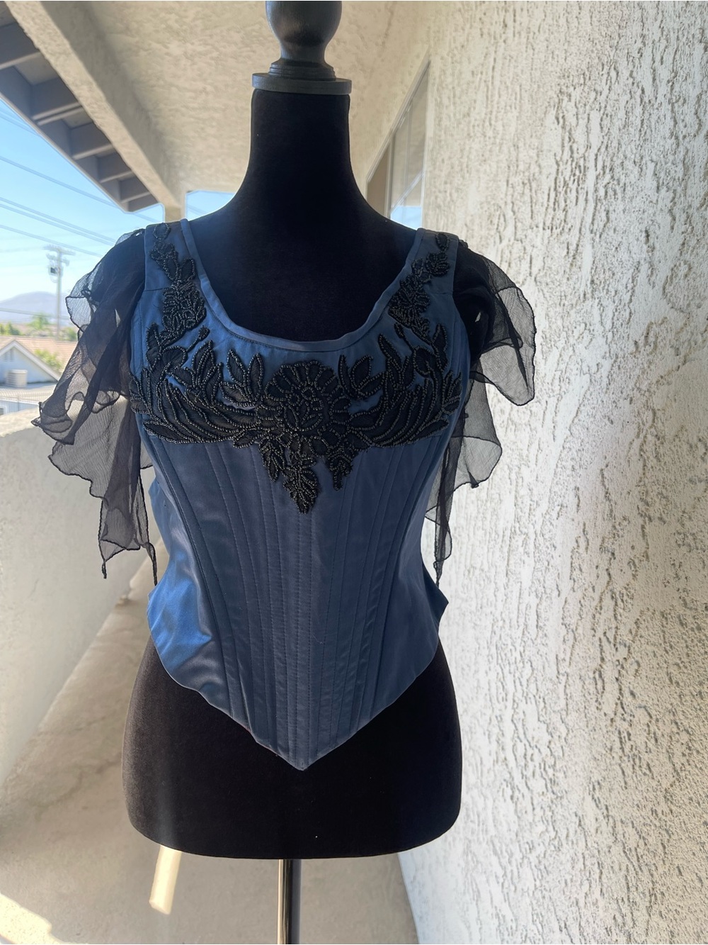 LESS HABITUDES. SIZE M Blue Corset Top with Black Beaded Applique